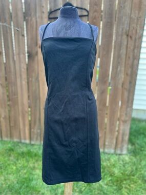 The Kript Classic Black Spaghetti-Strap Mini Dress